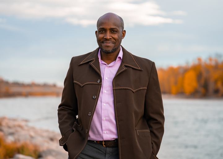 Portrait by the river in fall